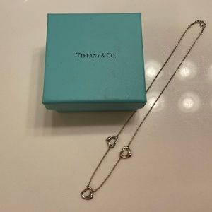 Elsa Peretti® Three Open Heart 16” Sterling silver necklace. Tiffany & Co.